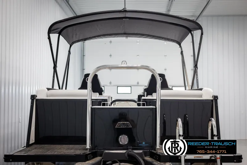 Slide: The Image of 2025 Avalon Catalina QL pontoon boat in a storage facility. - 7