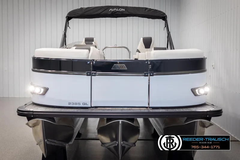 Slide: The Image of 2025 Avalon Catalina QL pontoon boat in showroom, front view. - 8