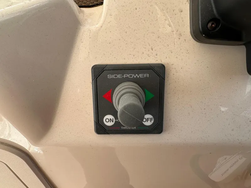 Slide: The Image of Side-Power control panel on 2014 Grady-White Freedom 335 boat. - 21