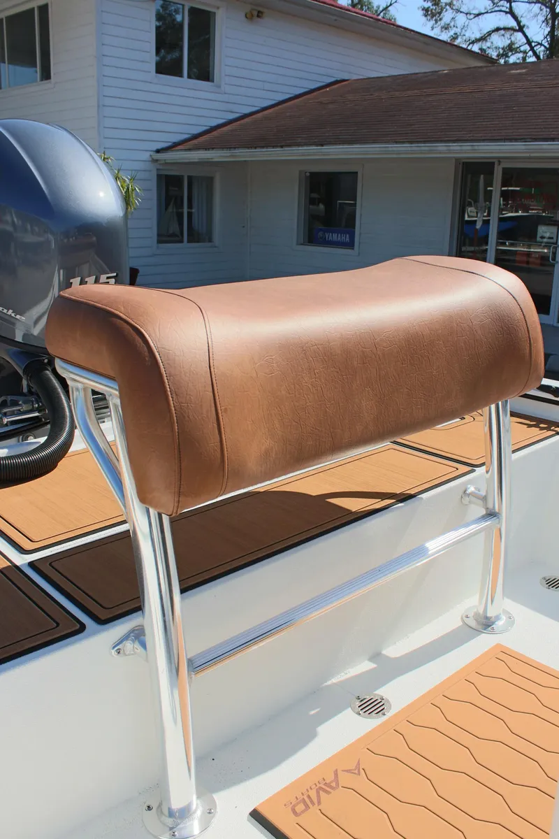 Slide: The Image of 2025 Avid 18 Rogue CC boat seat with brown leather upholstery. - 9