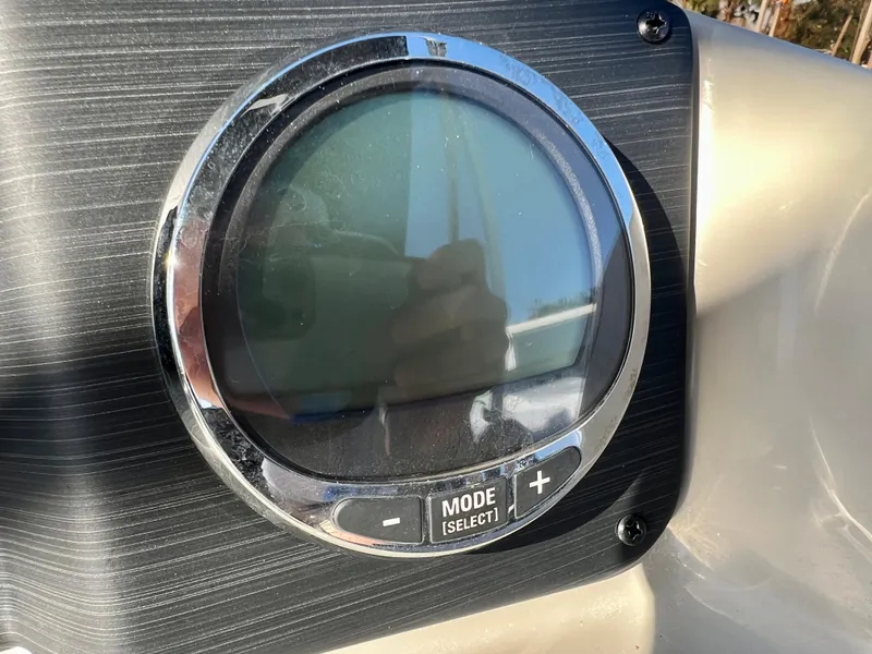 Slide: The Image of Close-up of 2023 Cypress Cay Seabreeze 232 dashboard display. - 15