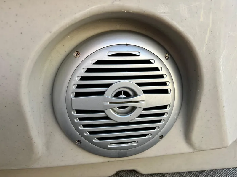 Slide: The Image of Close-up of a speaker on a 2023 Cypress Cay Seabreeze 232 boat. - 18