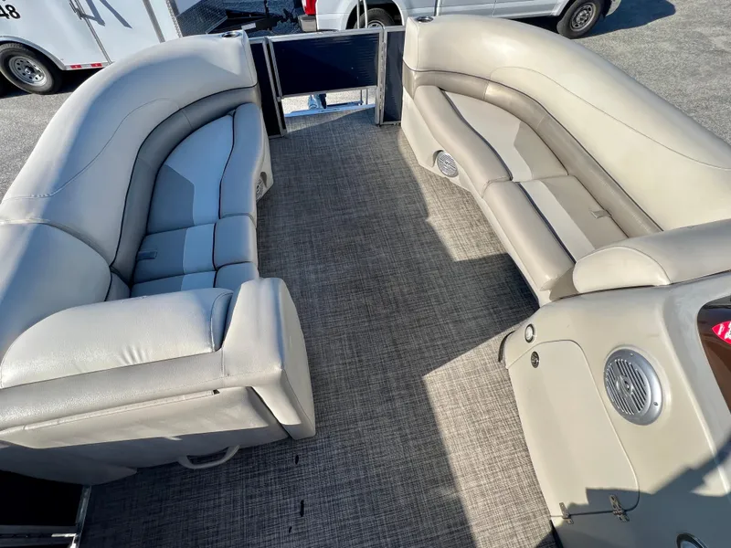 Slide: The Image of 2023 Cypress Cay Seabreeze 232 pontoon boat interior with plush seating and modern design. - 8