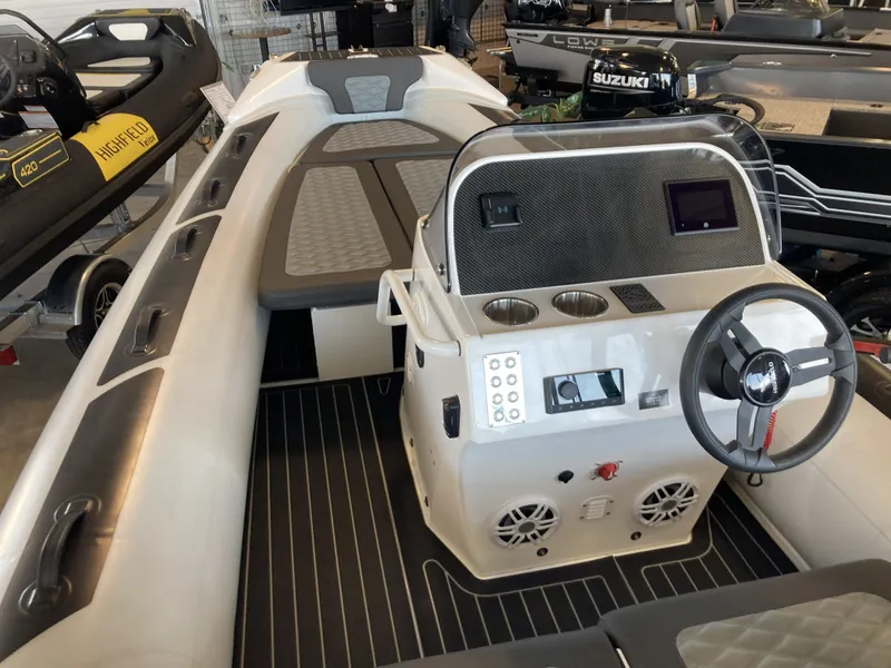 Slide: The Image of 2025 Highfield Sport 520 Rib with modern control console. - 16