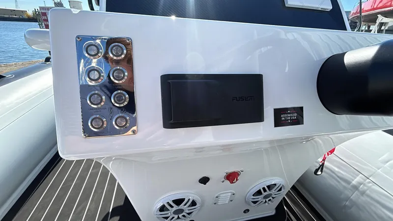 Slide: The Image of 2025 Highfield Sport 520 Rib displayed in showroom. - 7