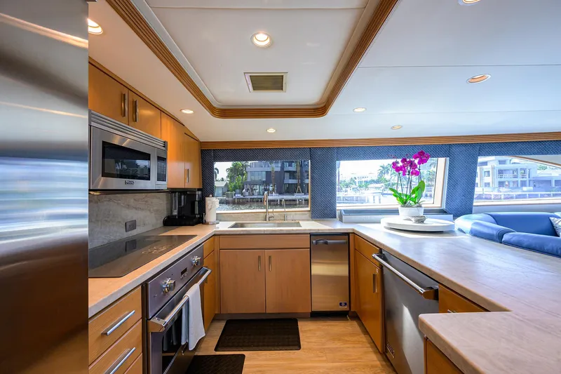 Slide: The Image of Luxurious kitchen interior of 1998 Westport Westbay Sonship Raised Pilothouse yacht with modern appliances. - 10