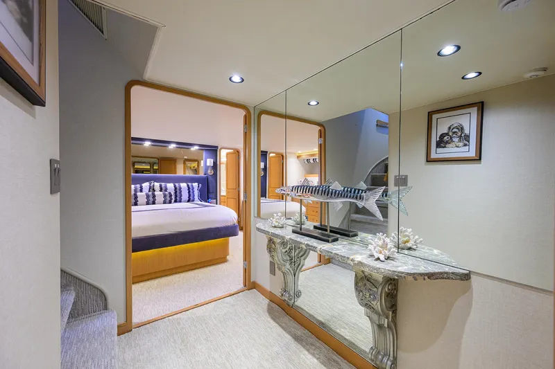 Slide: The Image of Luxurious interior of 1998 Westport Westbay Sonship yacht with elegant bedroom and decorative accents. - 15