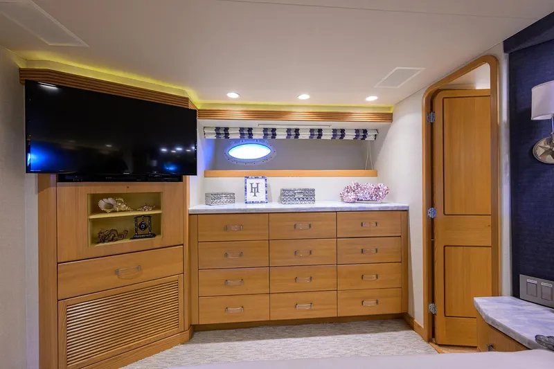 Slide: The Image of Luxurious cabin interior of 1998 Westport Westbay Sonship yacht with wooden cabinetry and modern decor. - 21