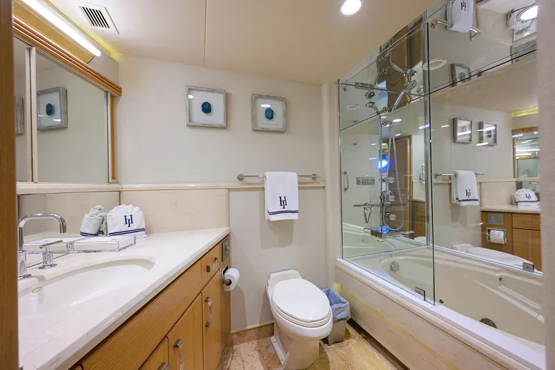 Slide: The Image of Luxurious bathroom in 1998 Westport Westbay Sonship yacht, featuring modern fixtures and elegant design. - 24