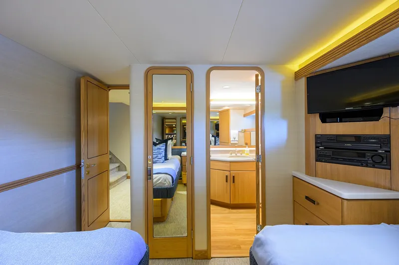 Slide: The Image of Luxurious 1998 Westport Westbay Sonship yacht interior with twin beds and modern amenities. - 32