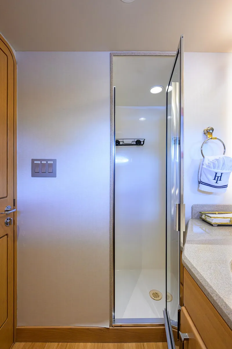 Slide: The Image of Shower area in 1998 Westport Westbay Sonship Raised Pilothouse yacht bathroom. - 34