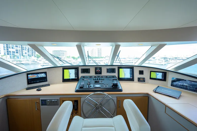Slide: The Image of 1998 Westport Westbay Sonship Raised Pilothouse interior with navigation equipment and panoramic windows. - 36