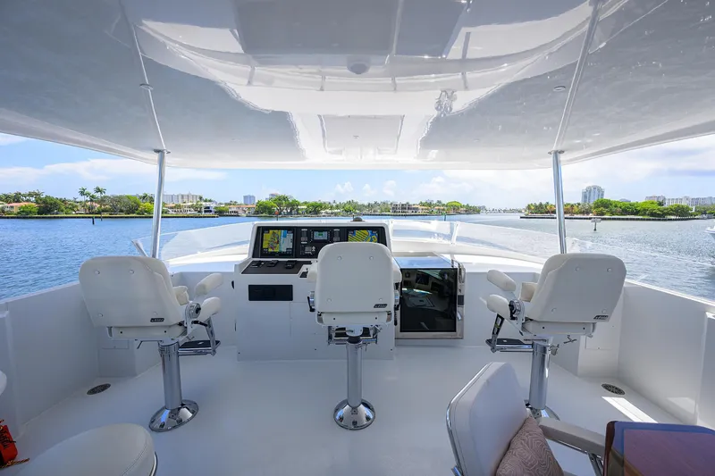 Slide: The Image of Raised pilothouse of 1998 Westport Westbay Sonship yacht with white seating and navigation equipment. - 41