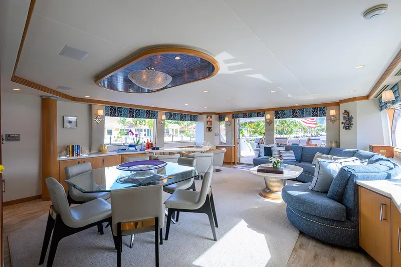 Slide: The Image of Luxurious interior of 1998 Westport Westbay Sonship yacht with elegant dining and seating areas. - 6