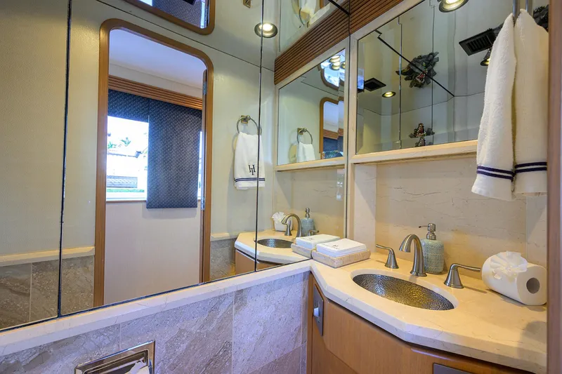 Slide: The Image of Luxurious bathroom in 1998 Westport Westbay Sonship yacht with dual sinks and elegant fixtures. - 8
