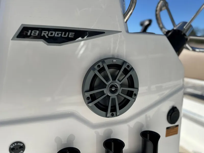 Slide: The Image of Close-up of 2025 Avid 18 Rogue boat dashboard with speaker detail. - 14