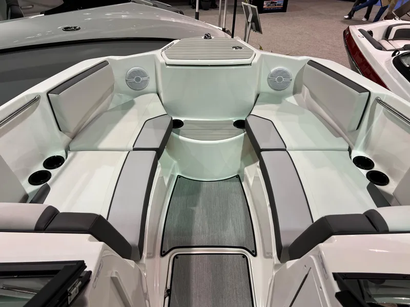 Slide: The Image of 2025 Yamaha Boats AR220 interior with spacious seating and modern design. - 8