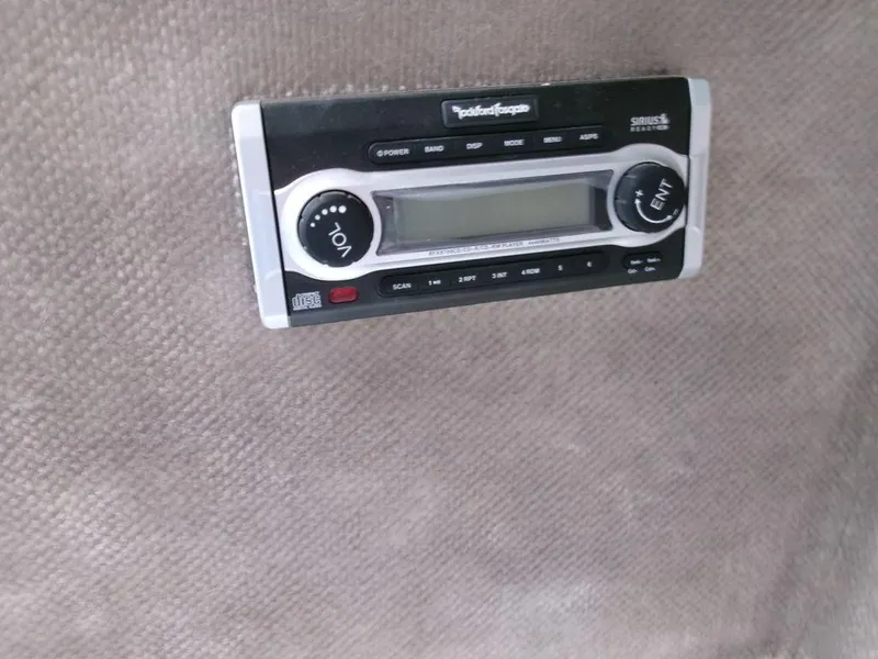 Slide: The Image of Rockford Fosgate stereo system in 1999 Seaswirl Striper 2600wa boat interior. - 13