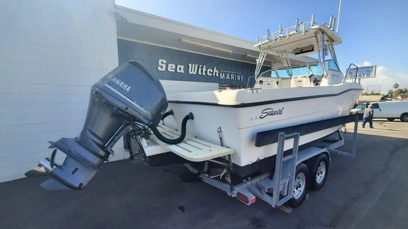 Slide: The Image of 1999 Seaswirl Striper 2600wa boat on trailer at Sea Witch Marine. - 2