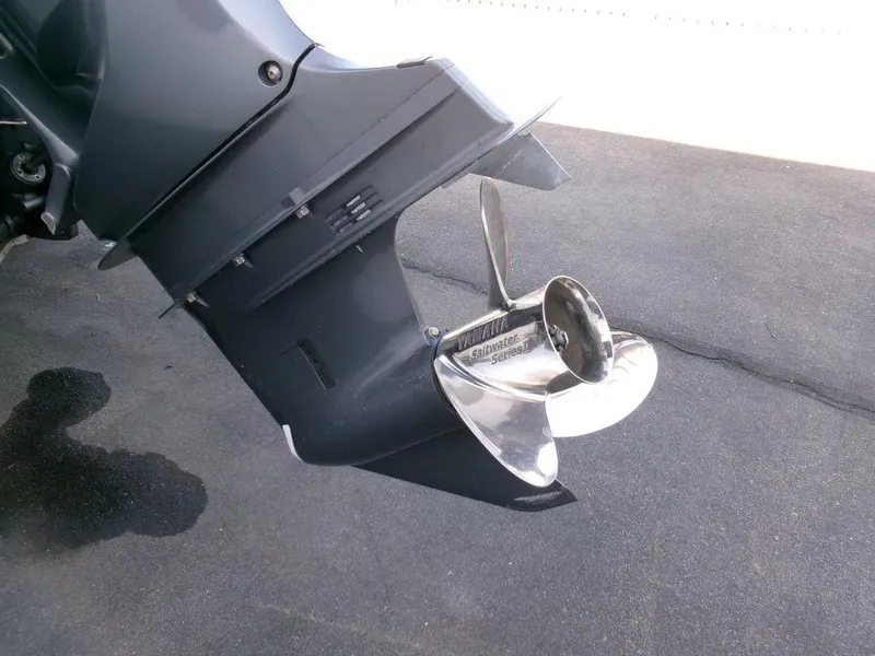 Slide: The Image of Close-up of a 1999 Seaswirl Striper 2600wa boat propeller on asphalt. - 25
