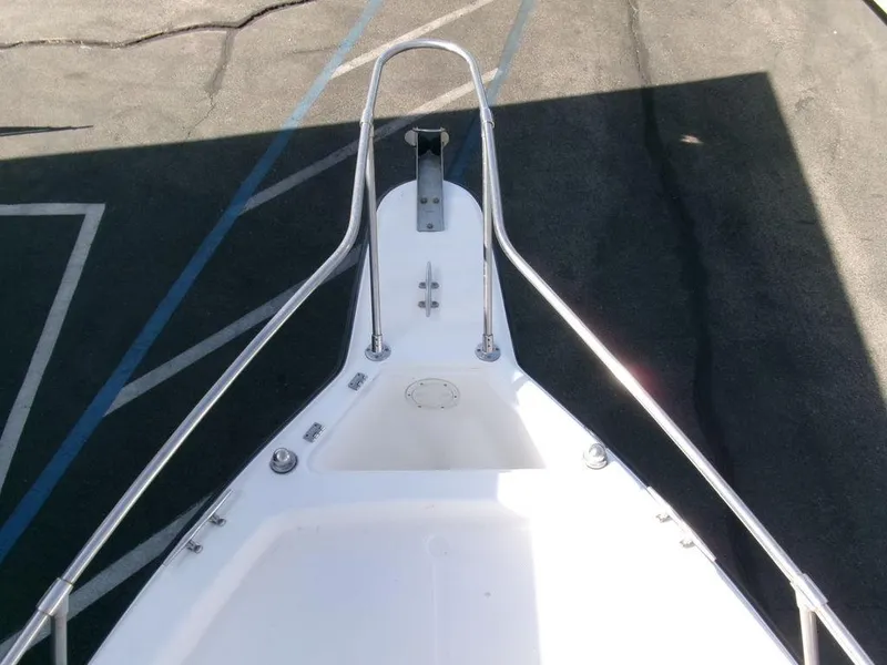 Slide: The Image of Bow of 1999 Seaswirl Striper 2600wa boat with stainless steel railings. - 4