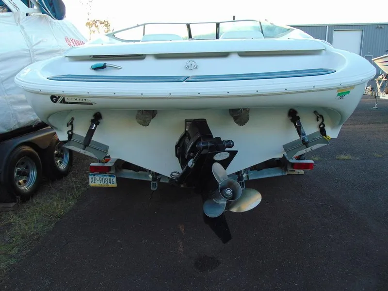 Slide: The Image of 1995 Baja 272 boat rear view with trailer and propeller. - 4