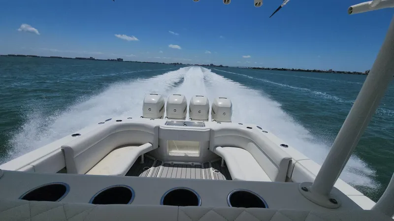 Slide: The Image of 2017 SeaVee 390Z boat speeding on open water, showcasing powerful engines and sleek design. - 4