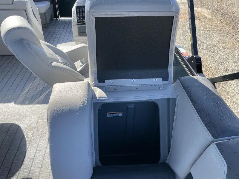 Slide: The Image of 2025 Starcraft SLS-3 boat interior with open storage compartment and seating. - 16