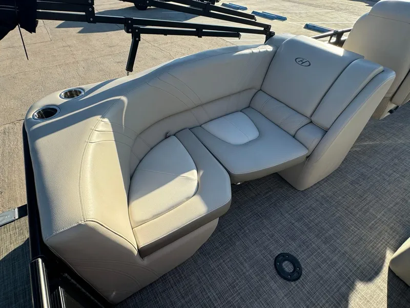 Slide: The Image of Luxurious seating on 2018 Harris Solstice 240 pontoon boat with cup holders. - 21