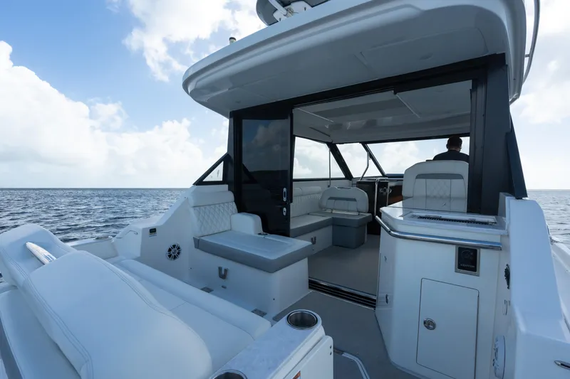 Slide: The Image of 2022 Regal 36 XO luxury yacht interior with ocean view. - 12