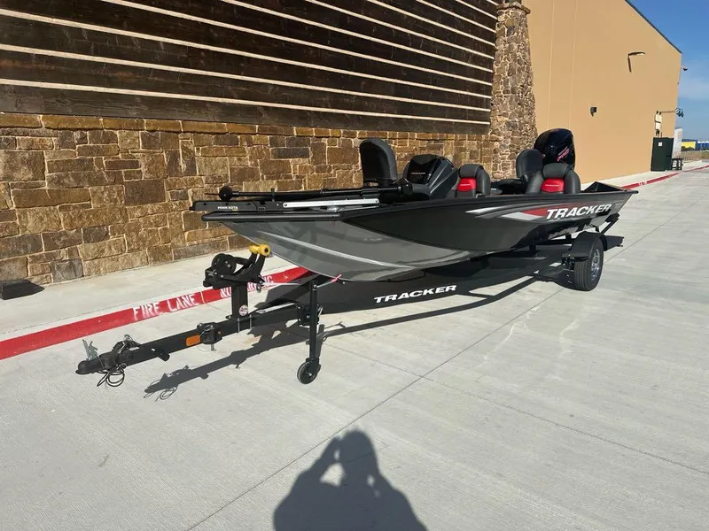 Slide: The Image of 2025 Tracker Pro Team 190 boat interior with steering wheel and control panel. - 4