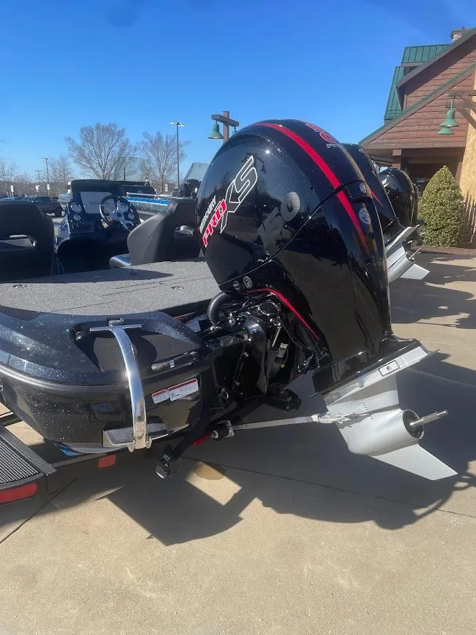 Slide: The Image of 2025 Nitro Z18 boat with powerful outboard motor on a sunny day. - 3