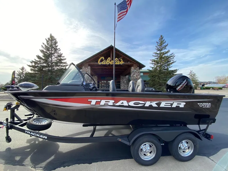 The Image of 2025 Tracker Targa V-18 WT boat on trailer outside Cabela's store. - 0