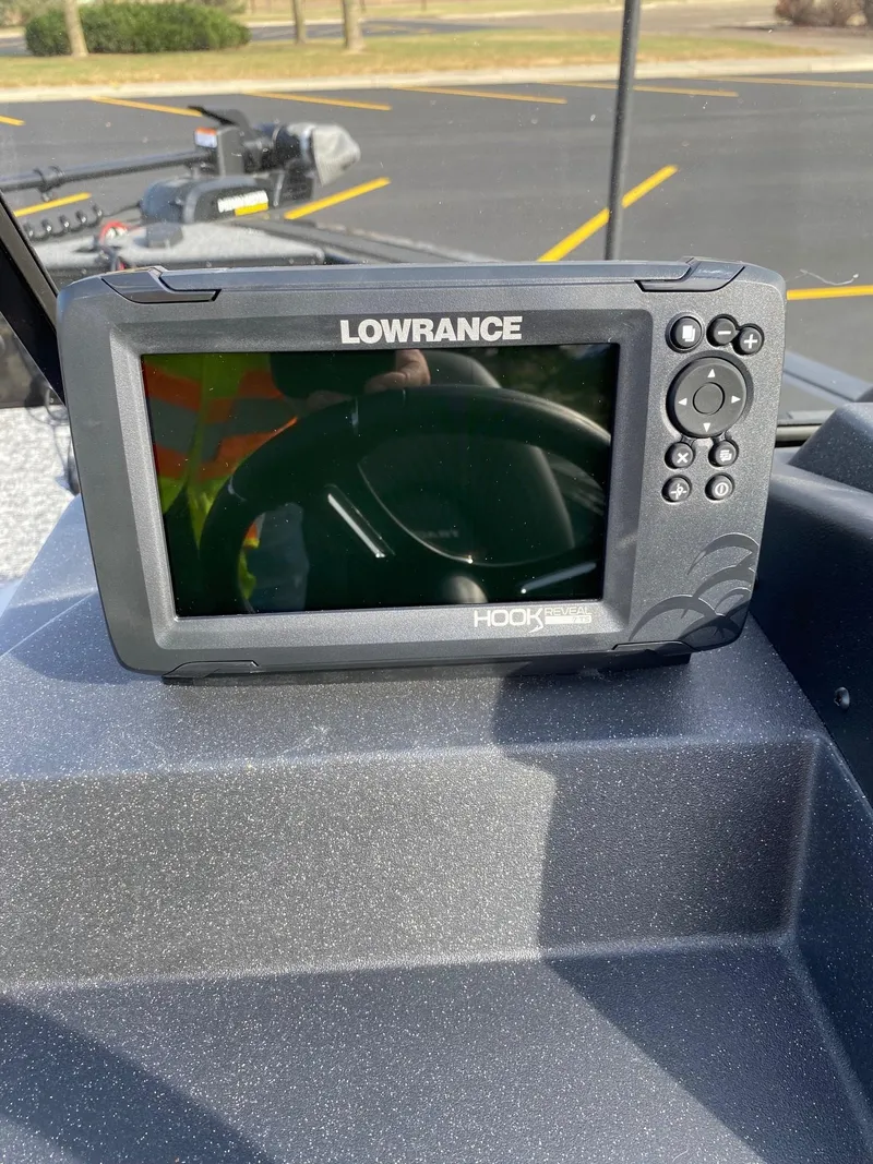 Slide: The Image of Lowrance fish finder on 2025 Tracker Targa V-18 WT boat dashboard. - 10