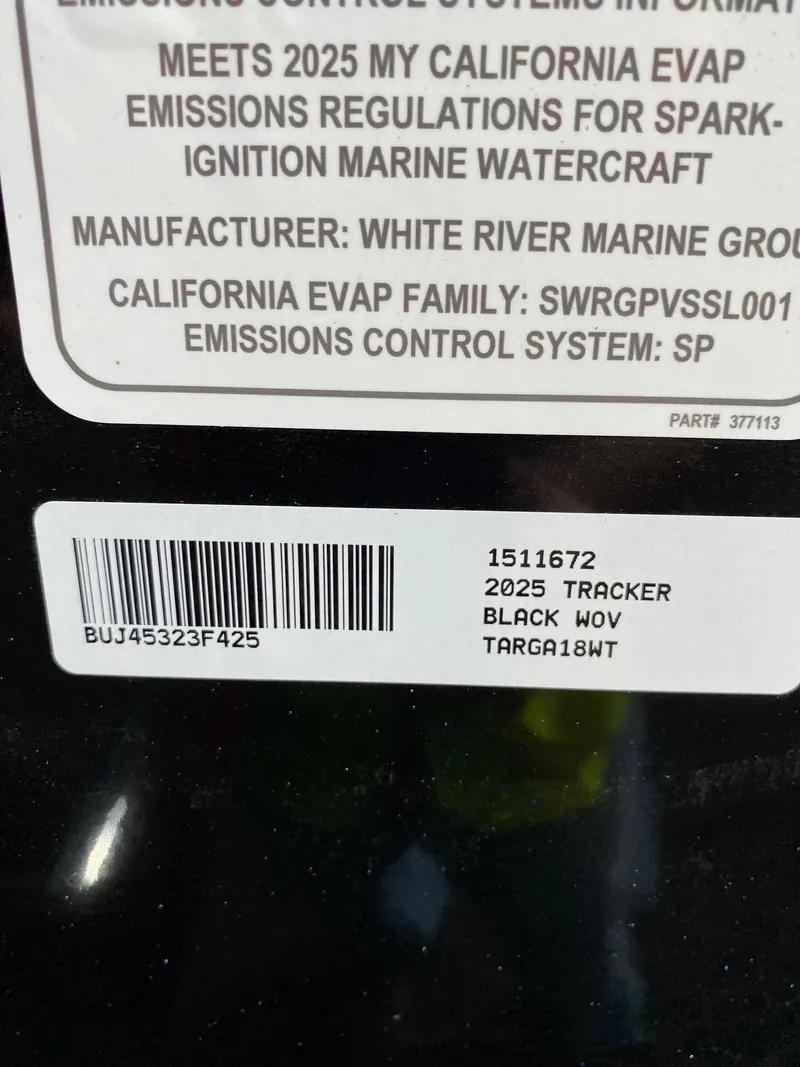 Slide: The Image of 2025 Tracker Targa V-18 WT emissions label with barcode and specifications. - 15