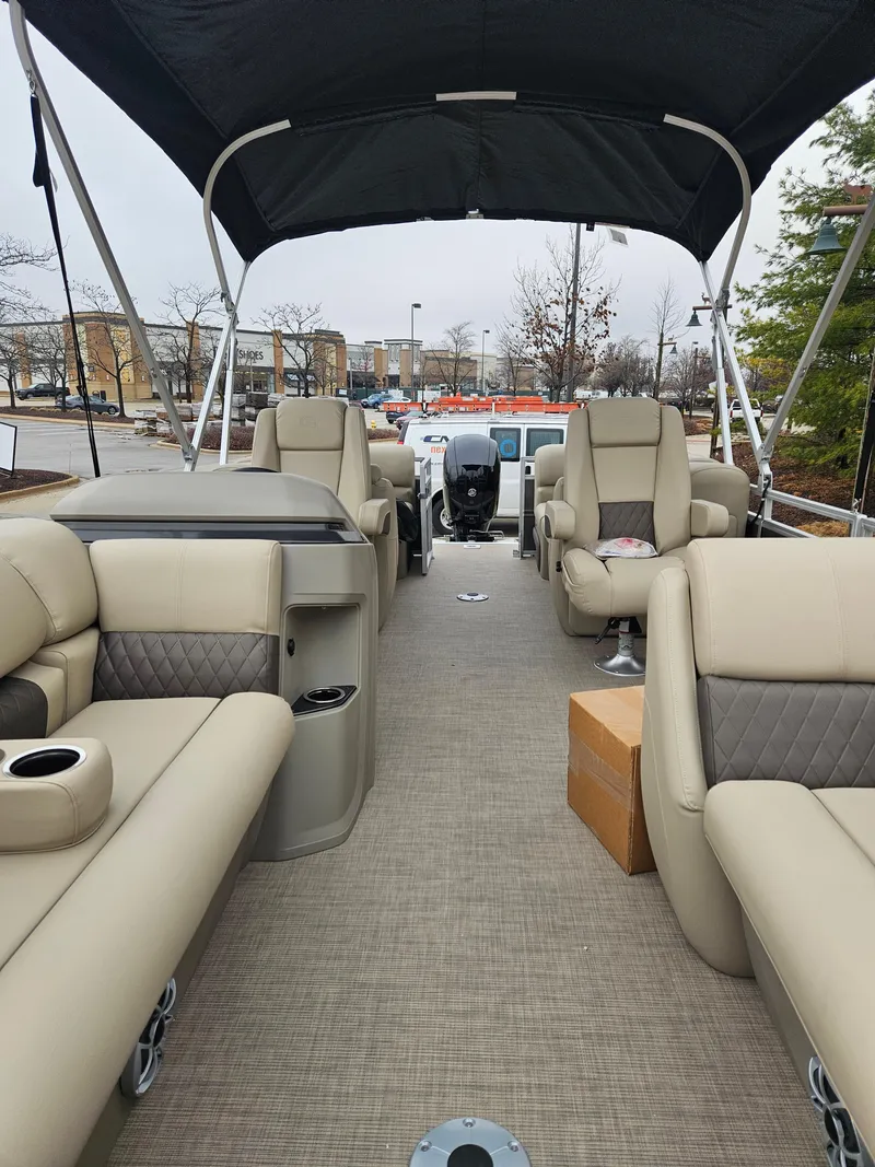 Slide: The Image of 2025 Sun Tracker Party Barge 22 DLX with spacious seating and canopy. - 2