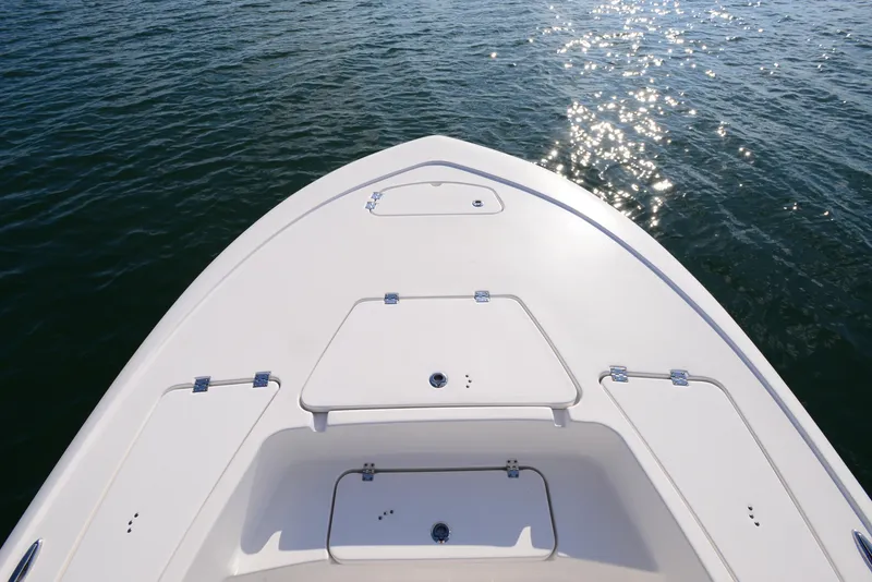 Slide: The Image of 2022 Tidewater 2110 Bay Max boat deck on sparkling water. - 12