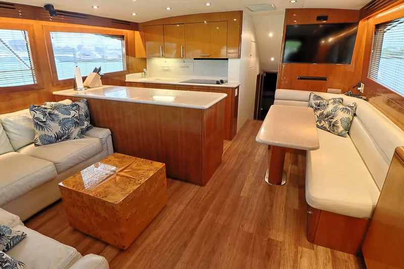 Slide: The Image of Luxurious interior of 2004 Hatteras 54 Convertible yacht with modern furnishings. - 26