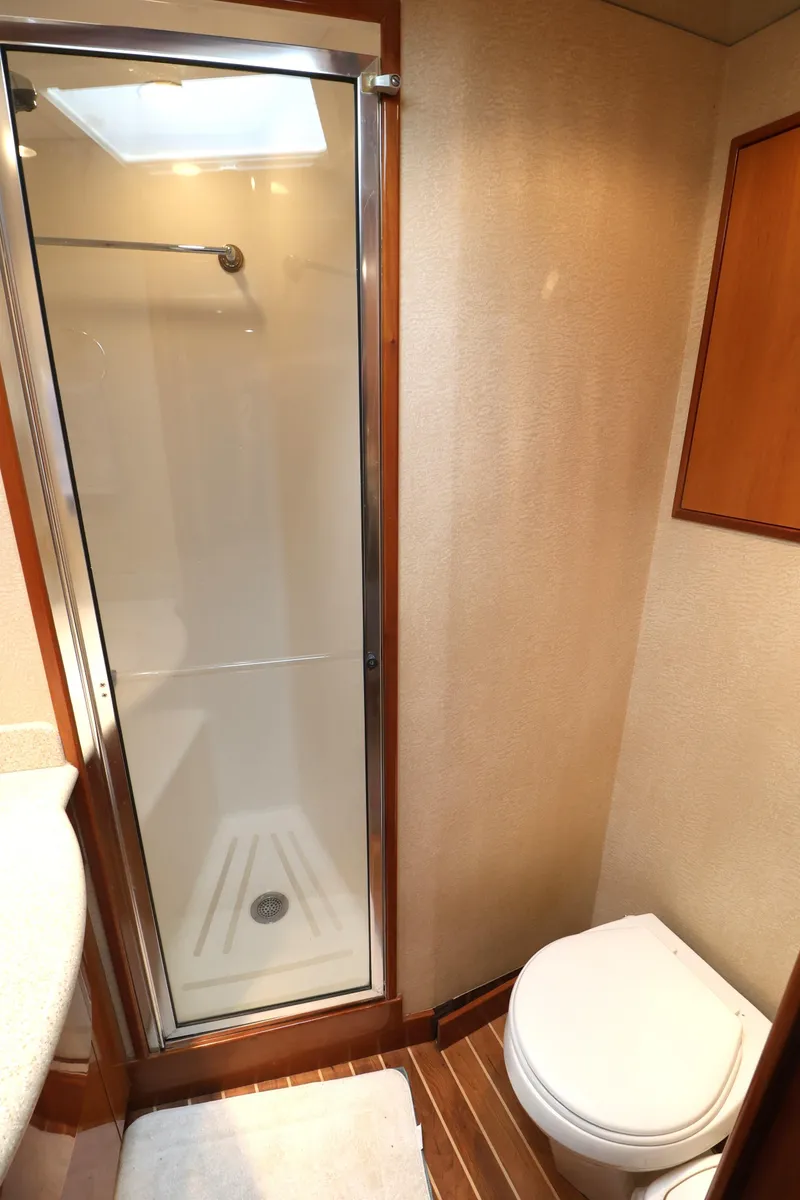 Slide: The Image of Bathroom in 2004 Hatteras 54 Convertible yacht with shower and toilet. - 39