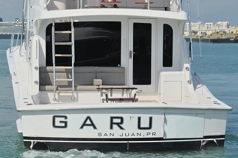 Slide: The Image of 2004 Hatteras 54 Convertible yacht, rear view, docked in San Juan, PR. - 8