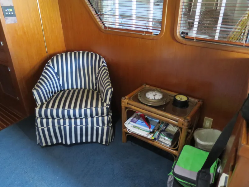 Slide: The Image of Striped chair and table in 1988 DeFever 53POC yacht interior. - 12