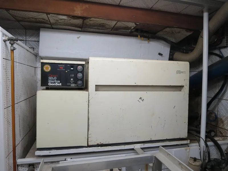 Slide: The Image of 1988 DeFever 53POC engine room with Onan Marine GenSet generator. - 17