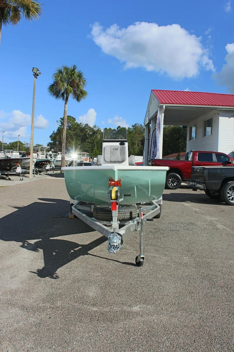 Slide: The Image of 2025 Avid 18 Rogue CC boat on trailer in sunny dealership lot. - 4