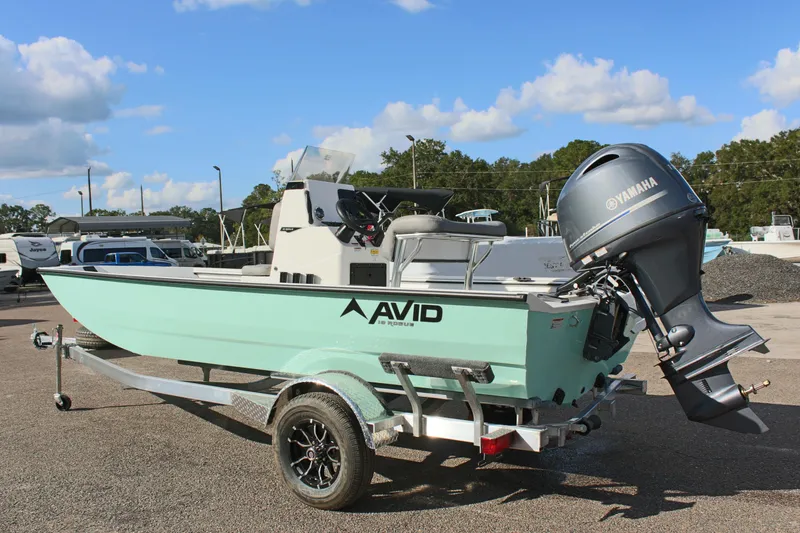 Slide: The Image of 2025 Avid 18 Rogue CC boat on trailer with Yamaha outboard motor. - 9