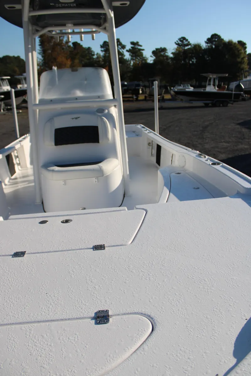 Slide: The Image of 2025 Tidewater 2210 Carolina Bay boat, spacious deck, sleek design, ideal for fishing. - 15