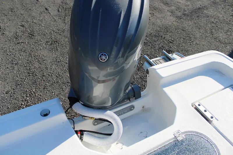 Slide: The Image of 2025 Tidewater 2210 Carolina Bay boat with Yamaha outboard motor, rear view. - 28