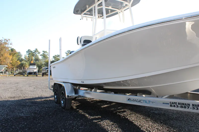 Slide: The Image of 2025 Tidewater 2210 Carolina Bay boat on trailer in outdoor setting. - 3