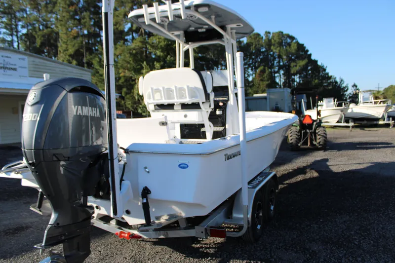 Slide: The Image of 2025 Tidewater 2210 Carolina Bay boat with Yamaha engine on trailer. - 4
