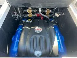 Slide: The Image of 2021 MasterCraft XStar engine compartment with Indmar engine components. - 3