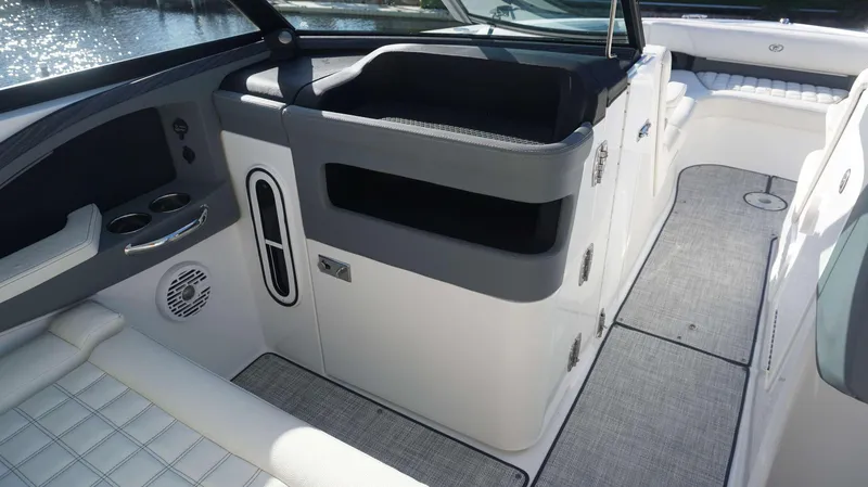 Slide: The Image of Interior of 2020 Cobalt 30 SC boat with seating and storage compartments. - 18